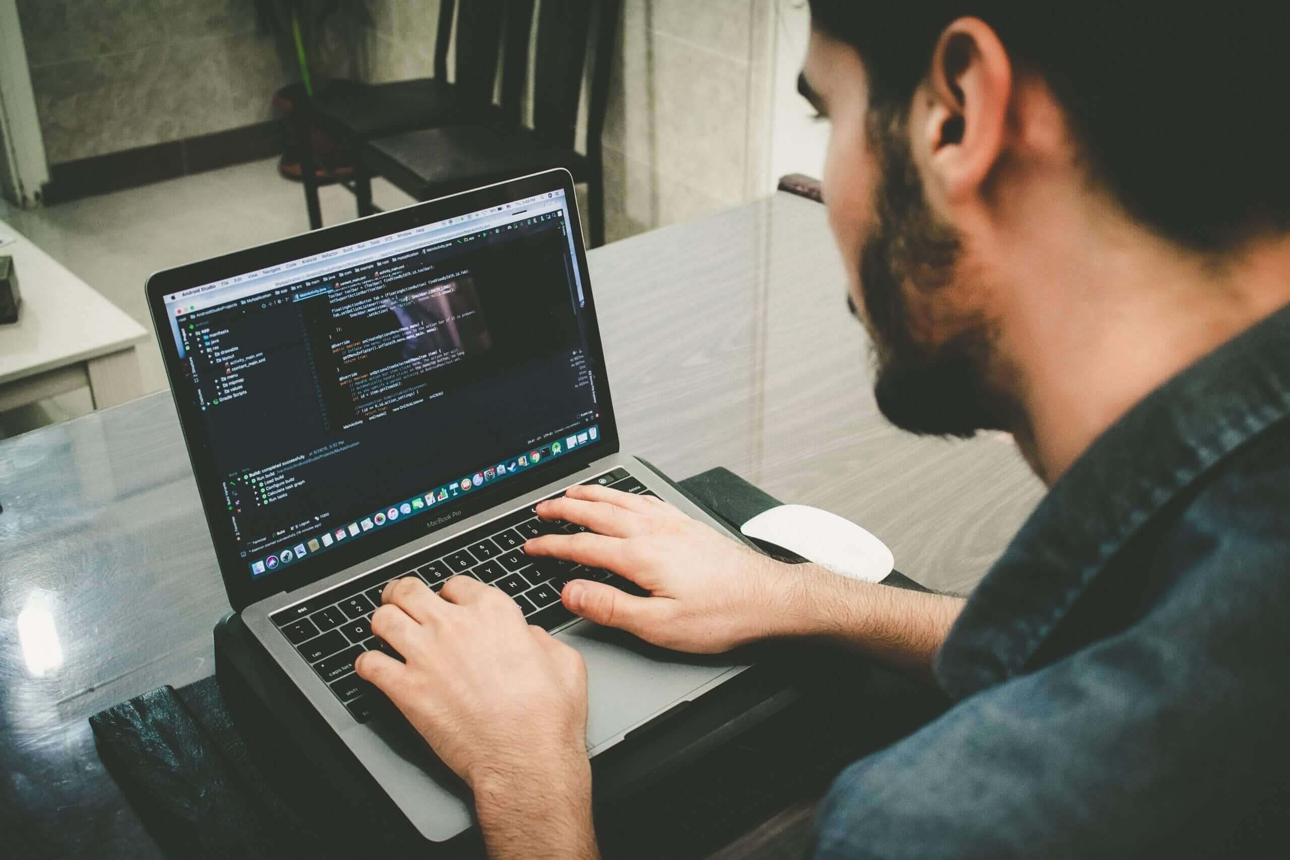 a coder with laptop